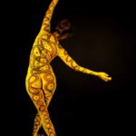 Stripes and Dots I: Body-painted dancer in the studio