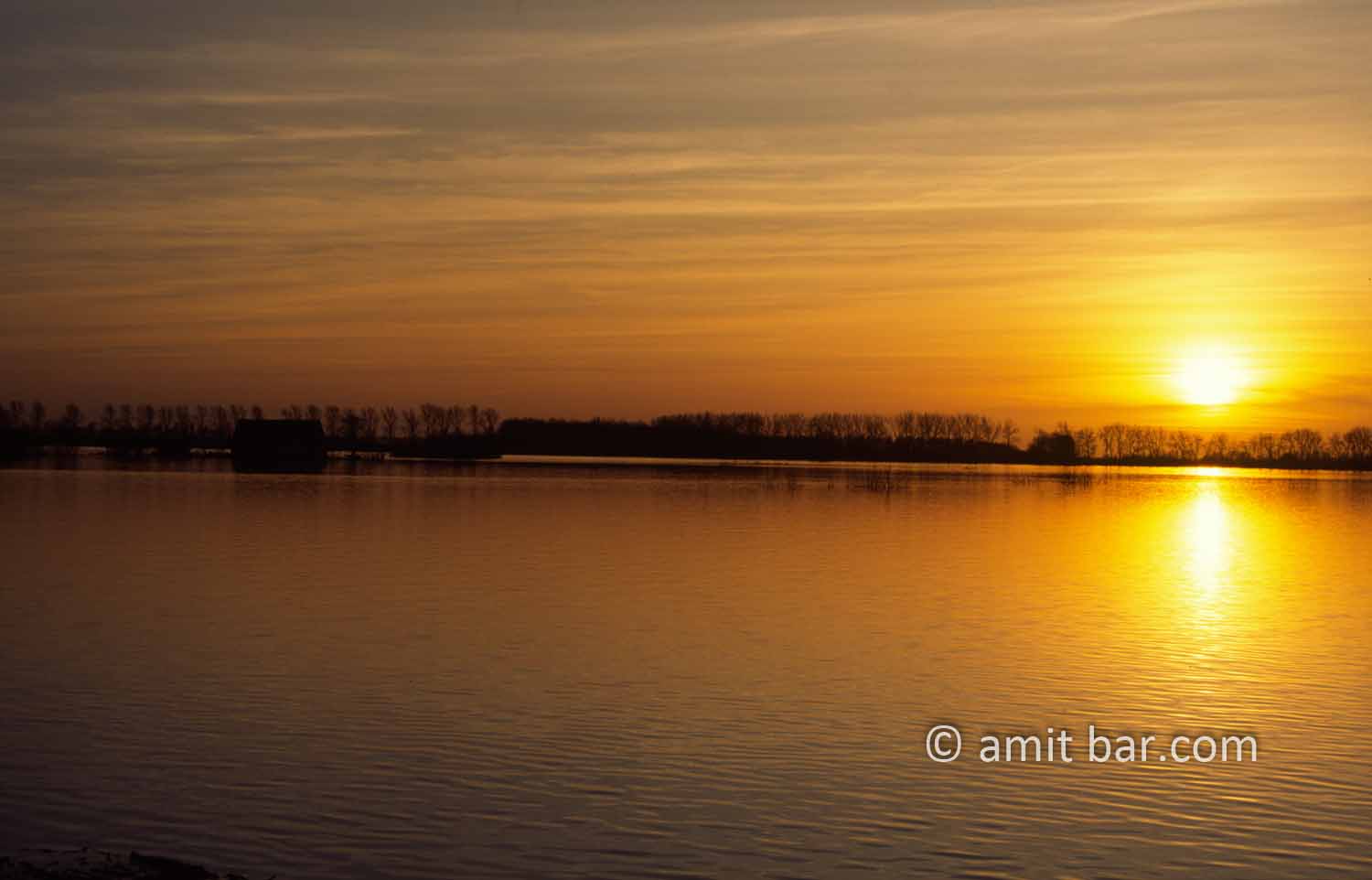 Sunset above flooded landscape at Doesburg, The Netherlands