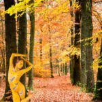 The Cuckoo V: body-painted dancer as a cuckoo is dancing in the forest