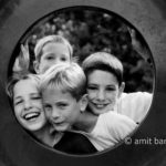 The four of them: Four children are looking to the camera