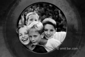 The four of them: Four children are looking to the camera