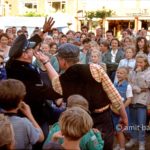 The revenge of the thief: The thief is catching back the policeman who caught him. Street theater in Doetinchem, The Netherlands