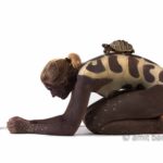 The tortoises I: Body-painted model with two tortoises / turtles