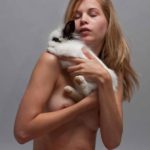 Top rabbit III: Nude model with a rabbit