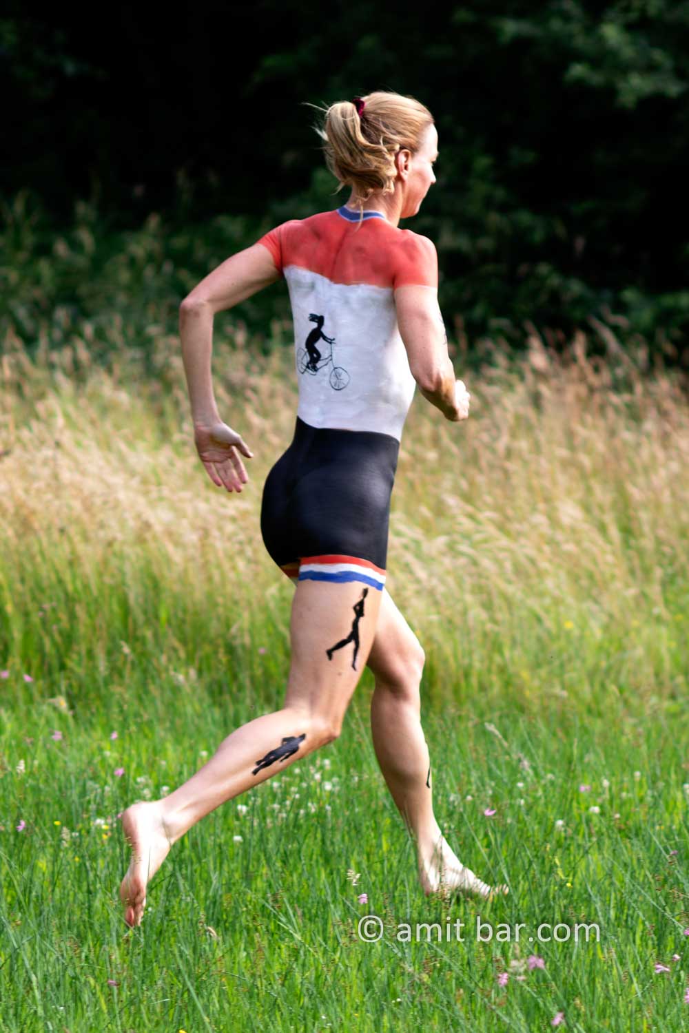 Triathlon athlete III: Body-painted triathlon athlete is running