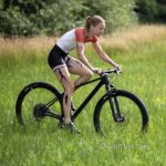 Triathlon athlete II: Body-painted triathlon athlete is cycling