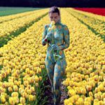 Tulips I: Body-painted model with tulips in the fields