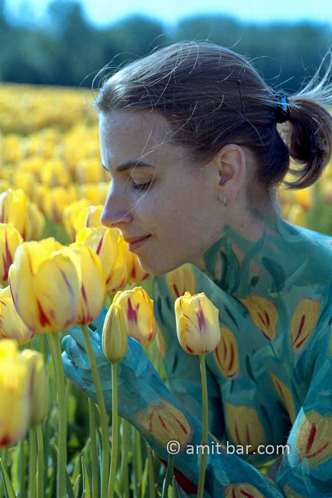 Tulips III: Portrait of body-painted model with tulips in the fields