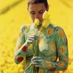 Tulips IV: Portrait of body-painted model with tulips in the fields