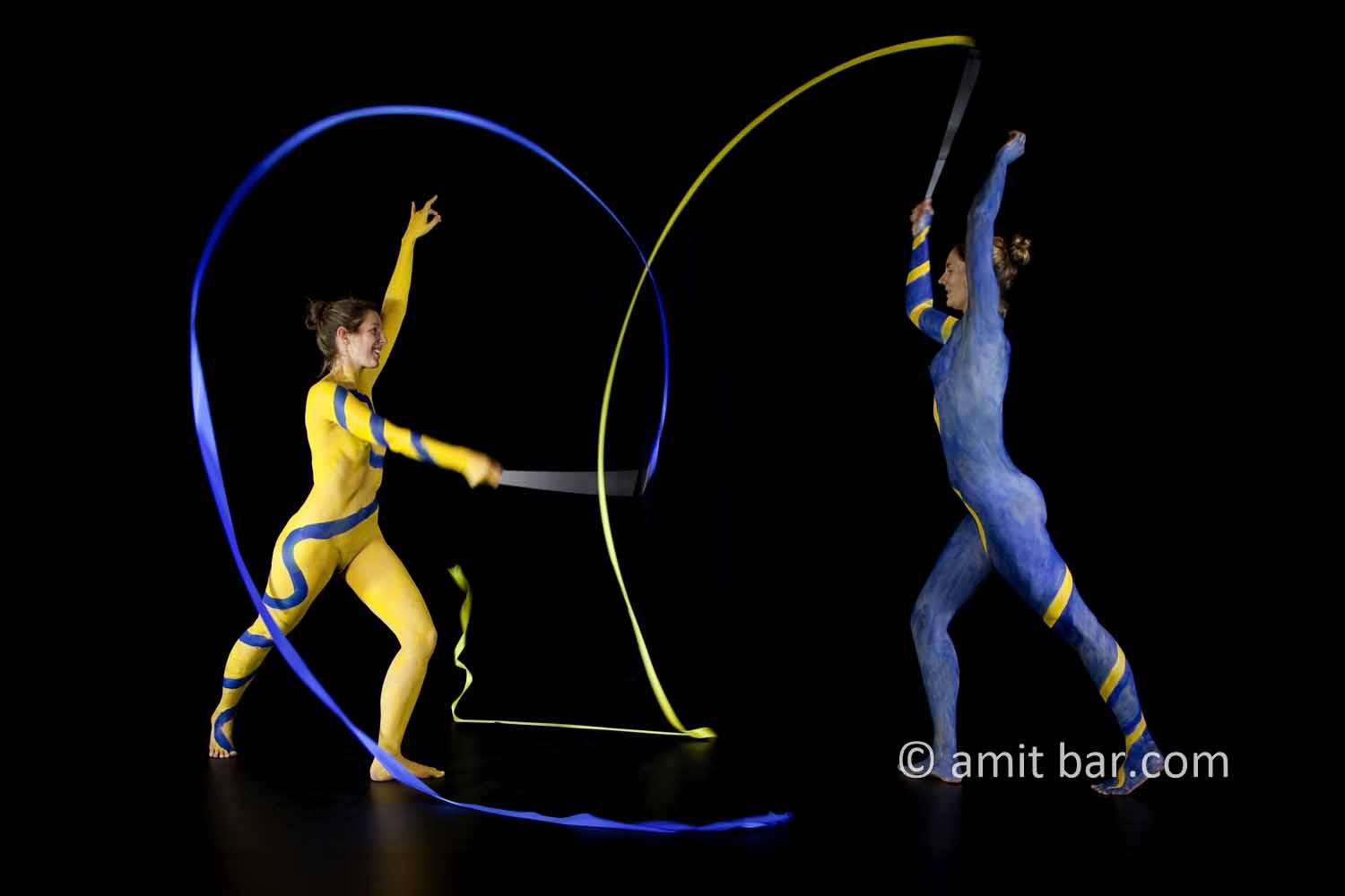 Two ribbons III: body-painted dancers with ribbons