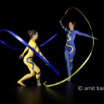 Two ribbons IV: body-painted dancers with ribbons