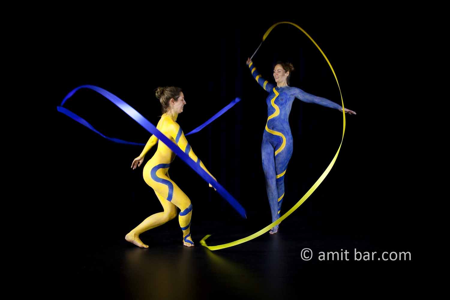 Two ribbons IV: body-painted dancers with ribbons