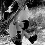 Upstairs, downstairs: Two boys swinging