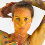 Variations III: body-painted model in colored stripes