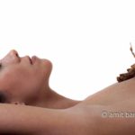 Walking leaf on woman's breast