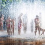 Water pleasure: Children enjoying water on Simonsplein, Doetinchem