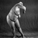 Waving: Nude model dancing