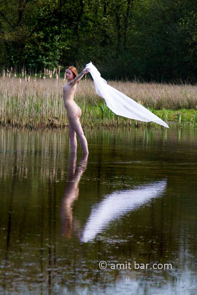 White sheet: A nude model in the lake with a white sheet