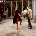 Who's afraid of the Devil II: An actor dressed as a devil is chasing a girl on street theater festival in Doetinchem, The Netherlands