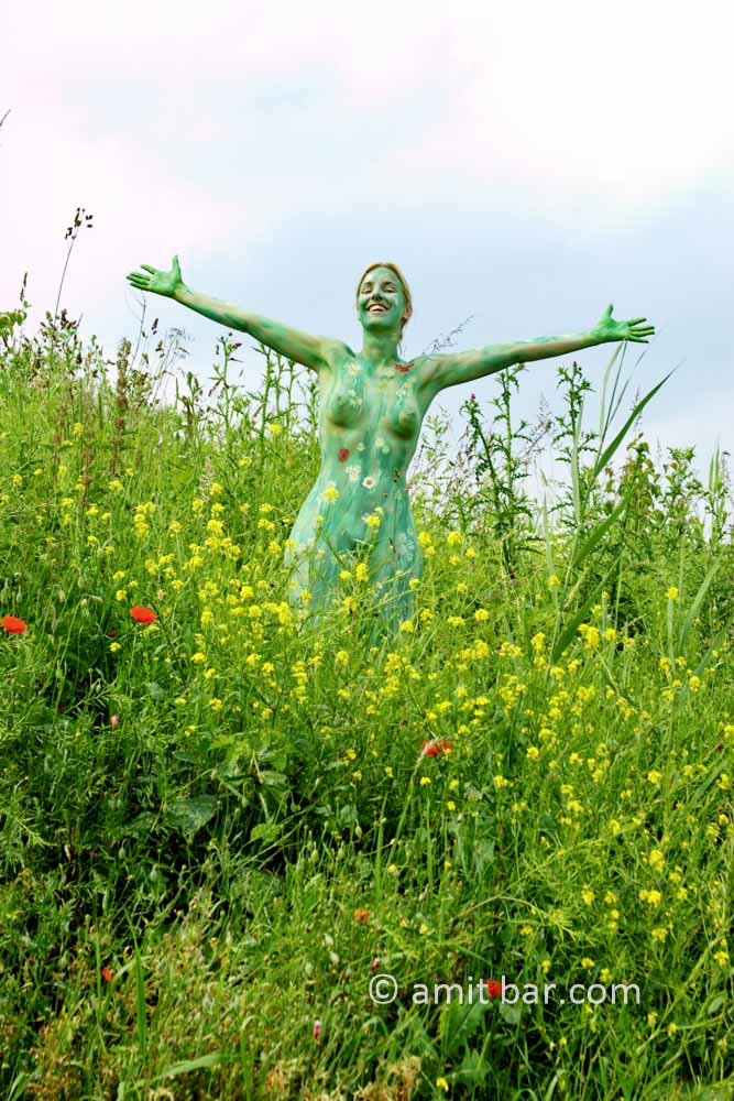 Wild spring flowers II: Body-painted woman with wild flowers