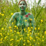 Wild spring flowers III: Body-painted woman with wild flowers