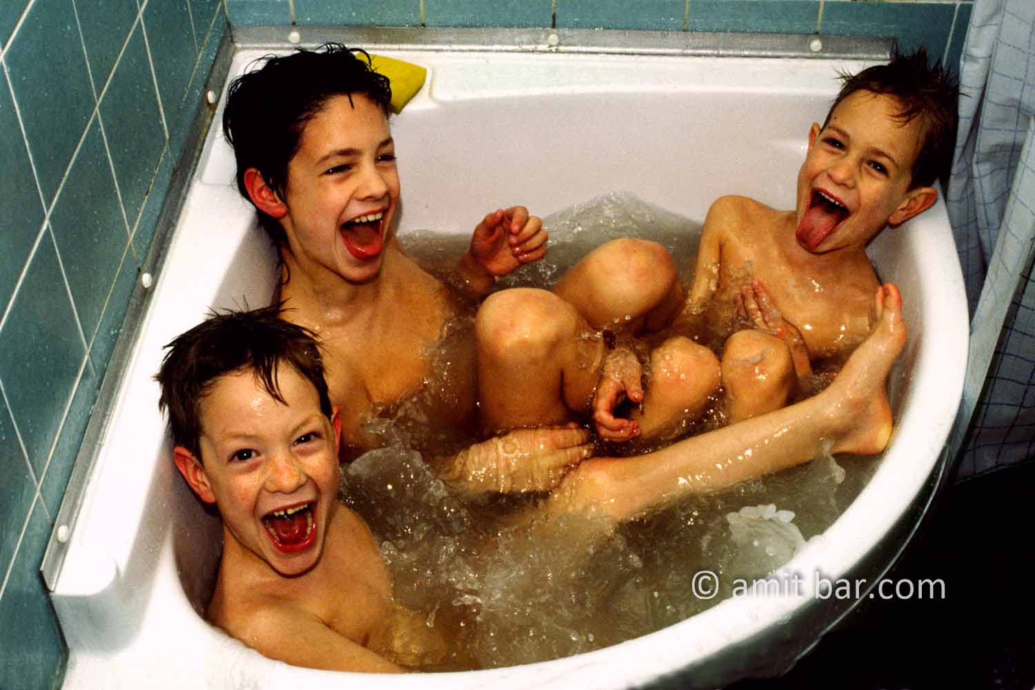 Wow!: Three boys in a corner bath